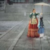 Under the Queens Umbrella